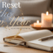 Cozy new year reset routine with journal, candle and warm lighting.